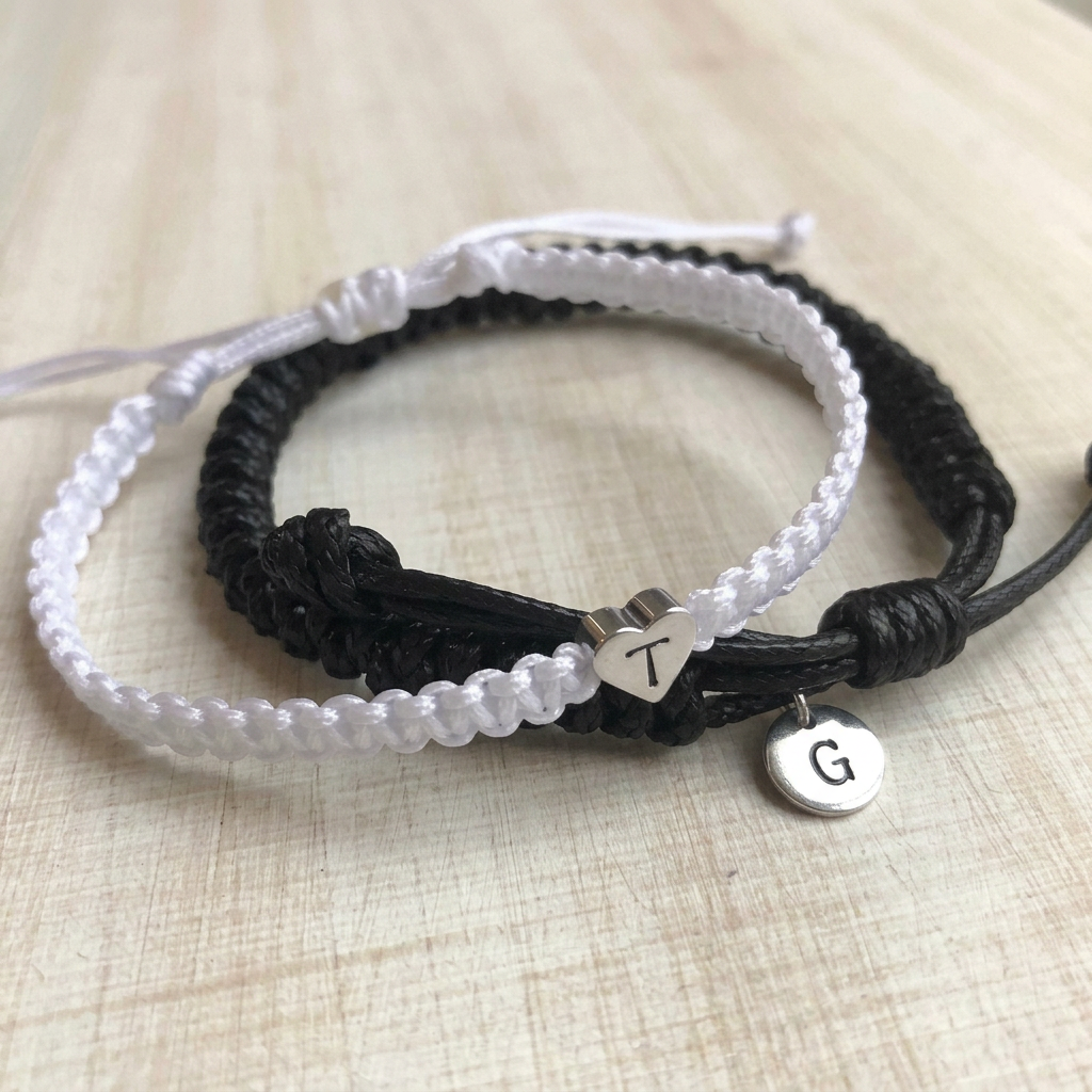 Black and White Bracelets with Silver Charms