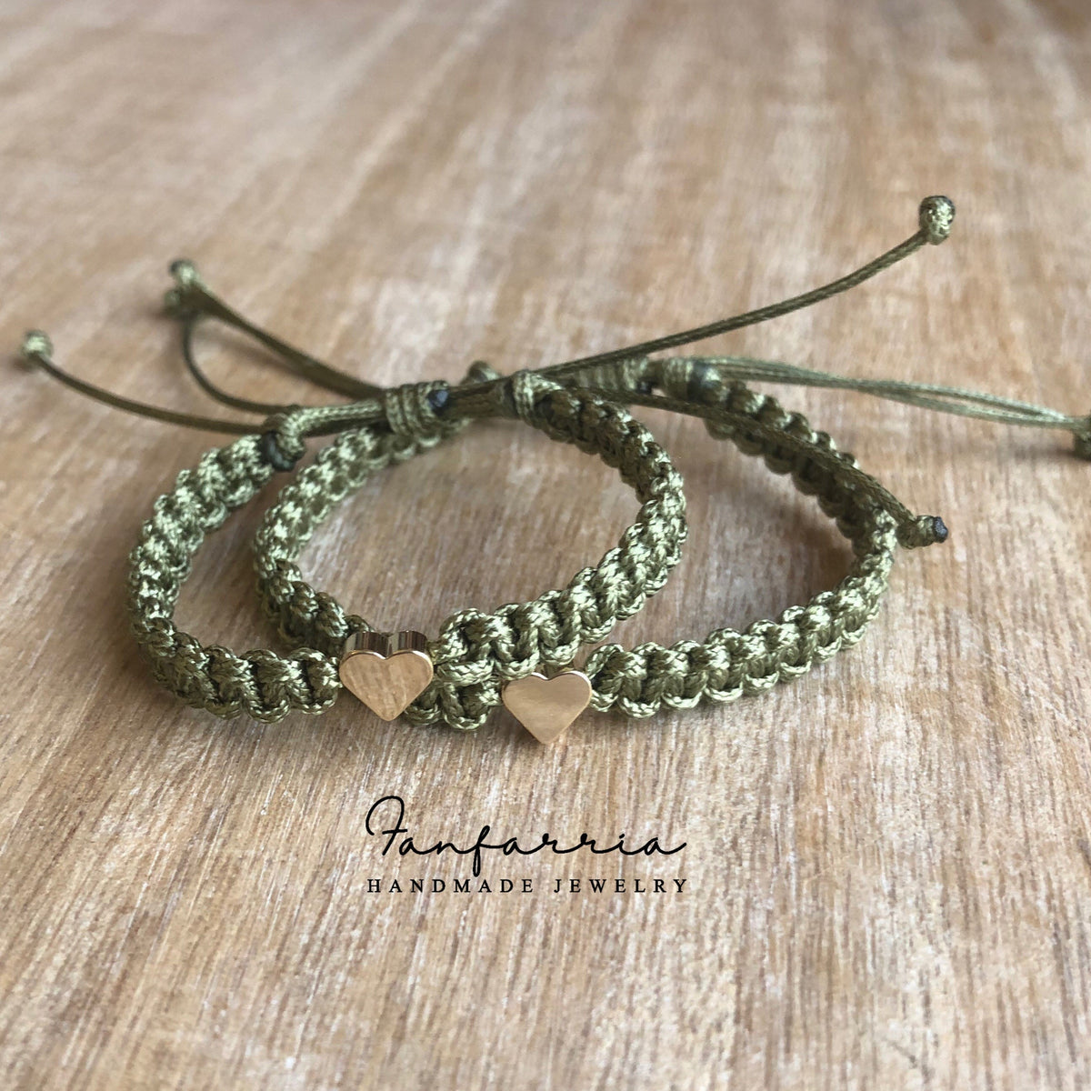 Two olive mommy and me bracelets with gold heart charms