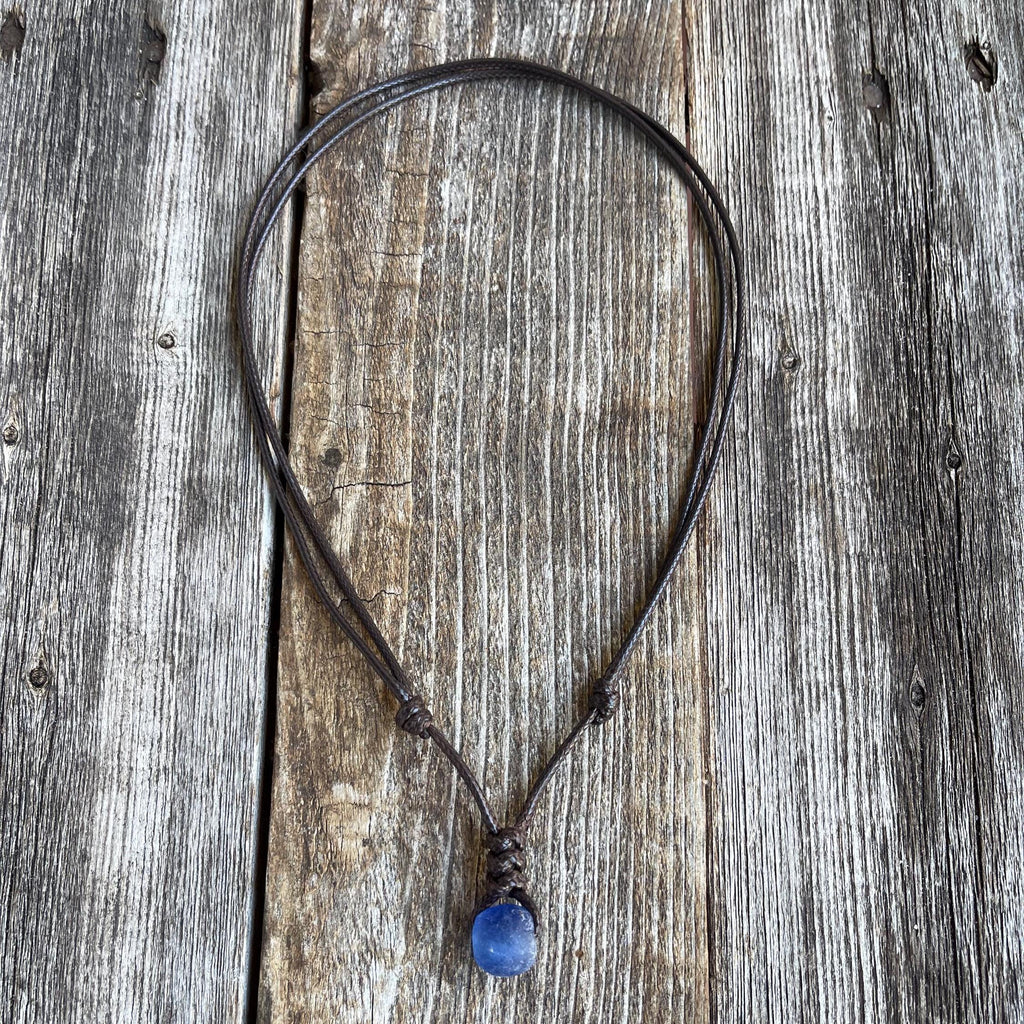 surfer necklace with a recycled blue sea glass bead