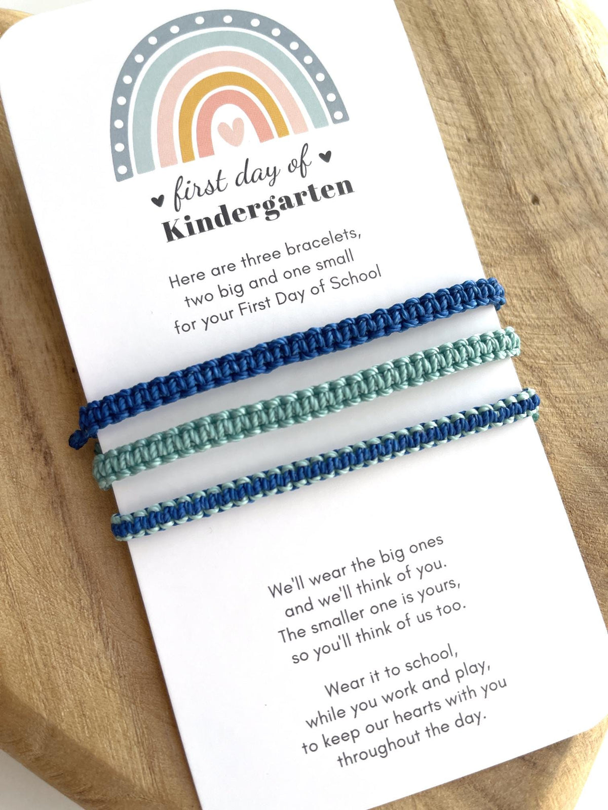 A first day of Kindergarten poem card with family matching bracelets for dad, mom, and child