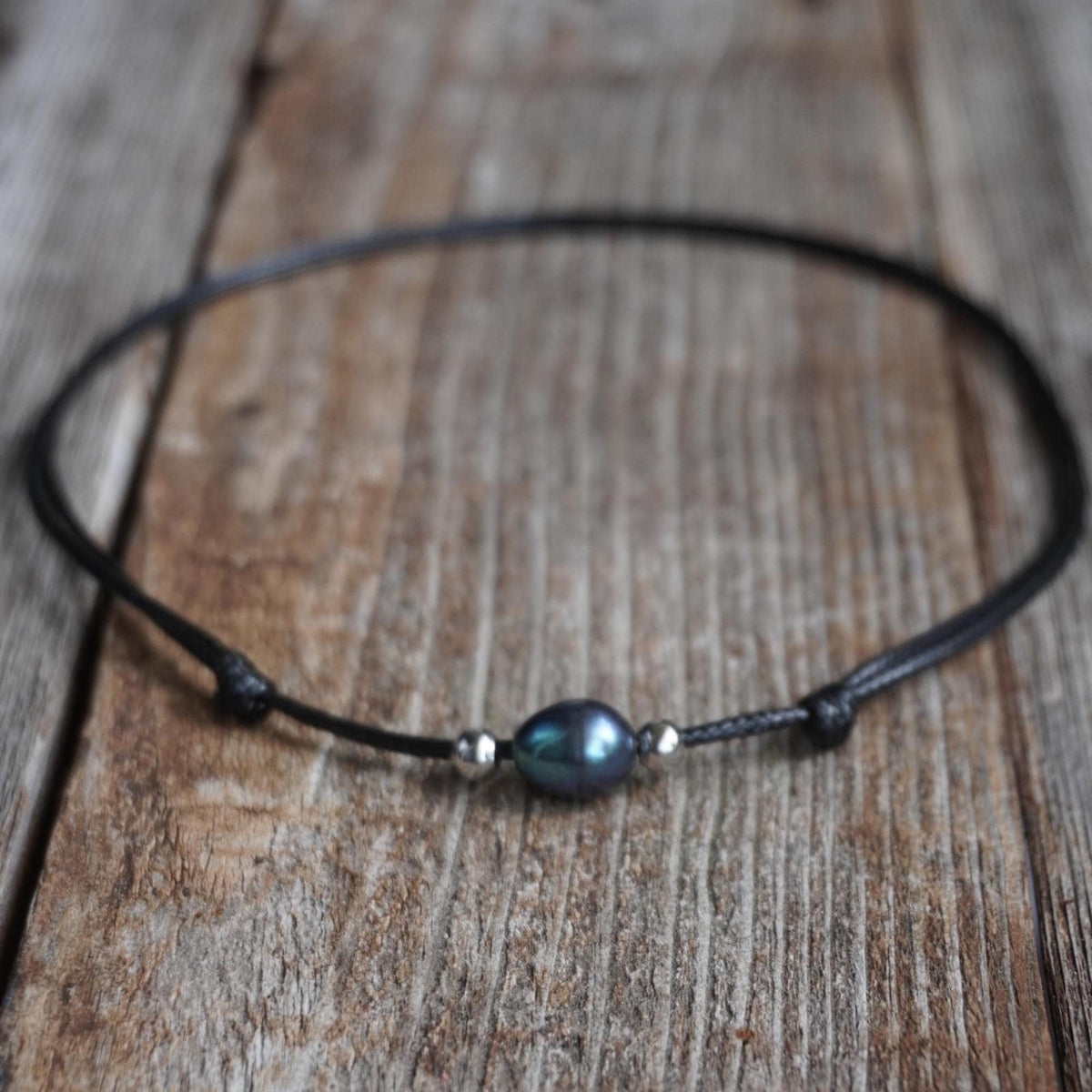 Surfer Necklace with Peacock Pearl Bead, Black Cord.