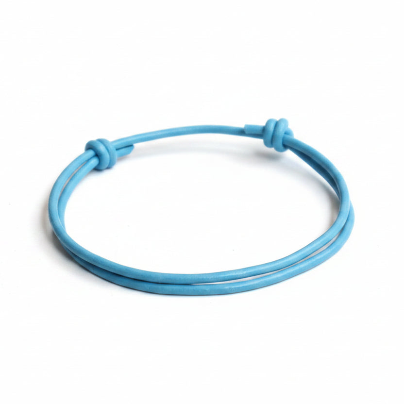 Leather cord bracelet with adjustable sliding knot