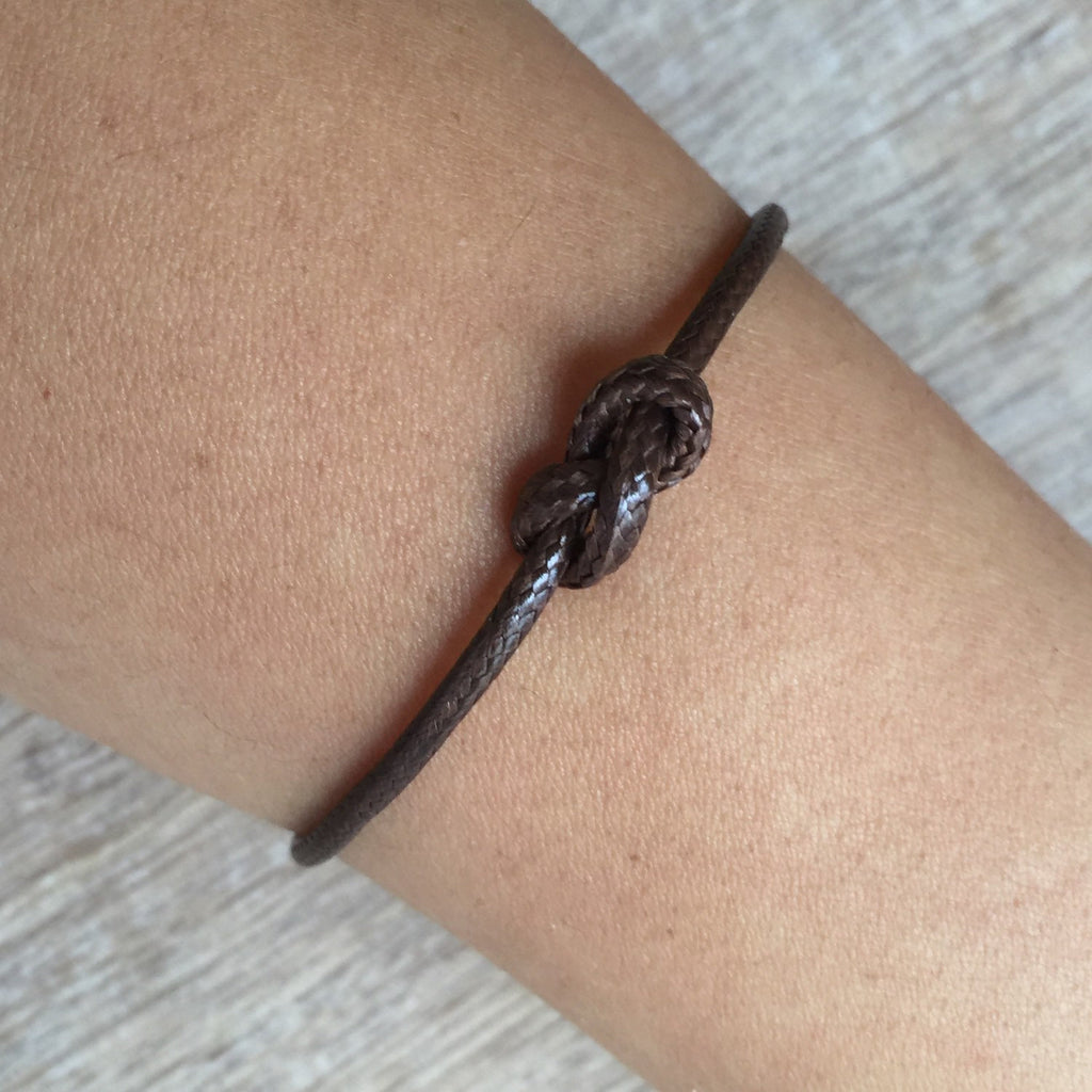 Lovers Key brown waxed cord couple bracelets flat lay adjustable waterproof
