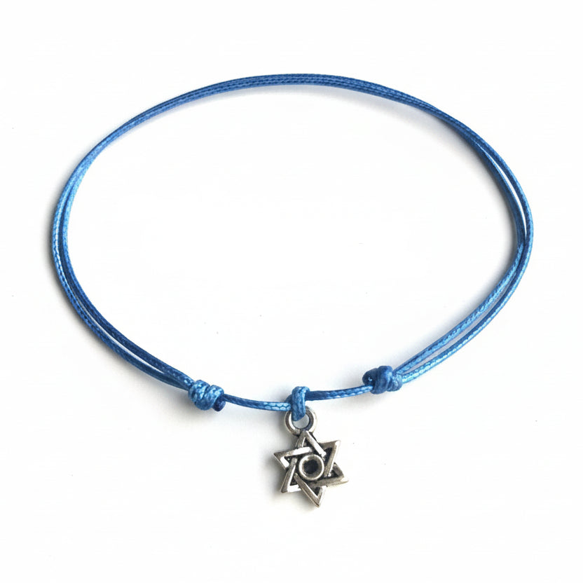 Blue cord bracelet with a Star of David charm on a white background