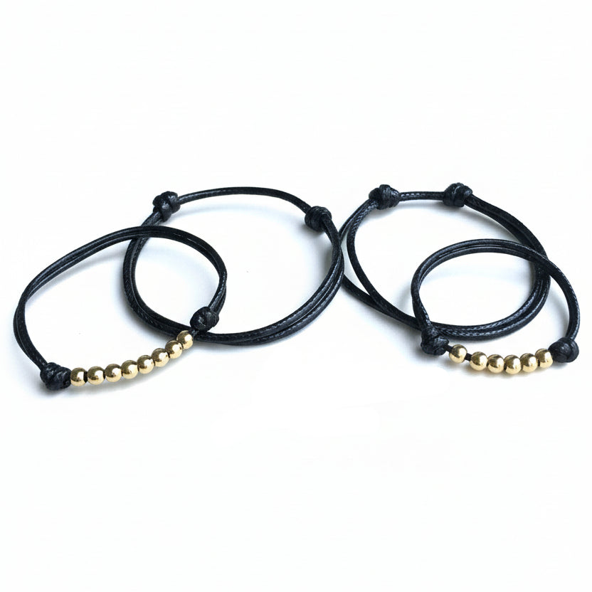 Black Family Gold Bead Bracelets