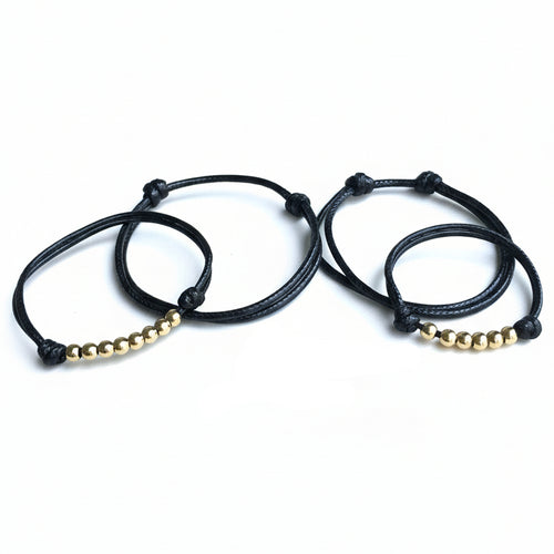 Black Family Gold Bead Bracelets