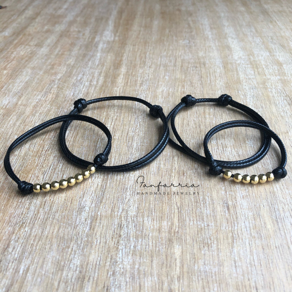 Black Family Gold Bead Bracelets