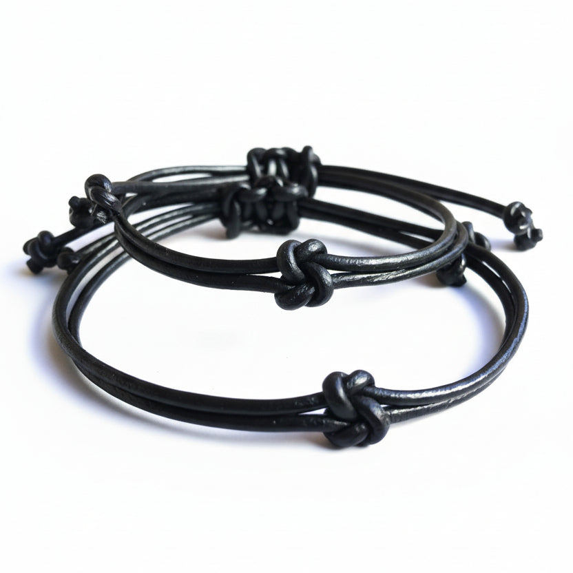 Leather knot his and hers couple bracelets flat lay multiple cord options